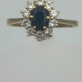 Anillo oro 18k con diamantes  T-B y zafiro