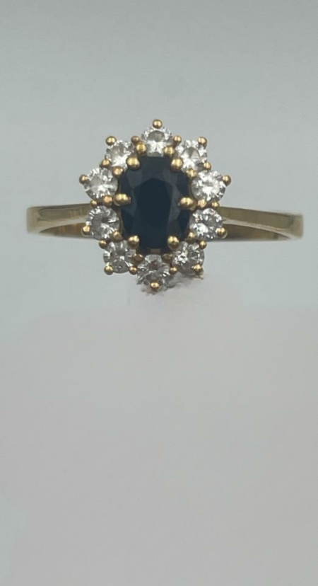 Anillo oro 18k con diamantes  T-B y zafiro