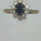 Anillo oro 18k con diamantes  T-B y zafiro